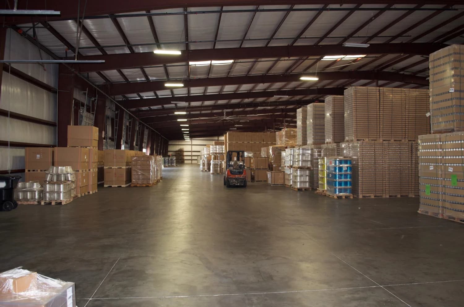 C&C Warehouse interior floor with racked inventory